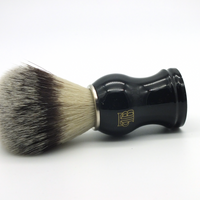 The Personal Barber Synthetic Hair Shaving Brush  lying on its side. Silvertip nylon hairs